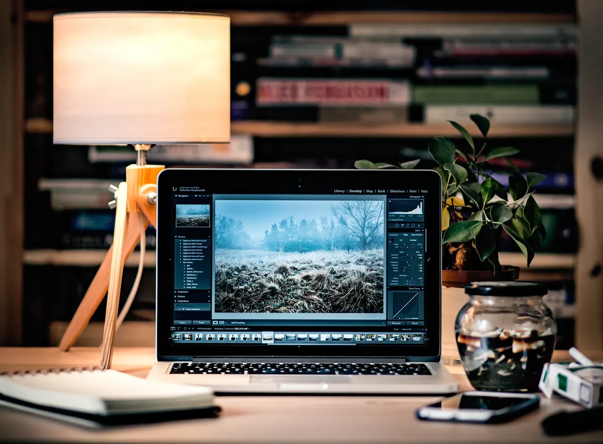 Laptop and notebook on a desk